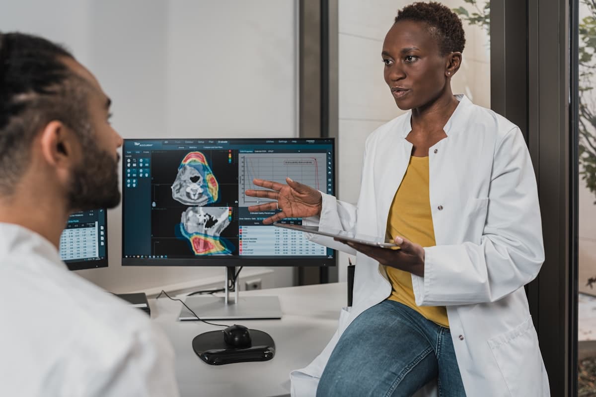 Clinician showing a patient images on a screen